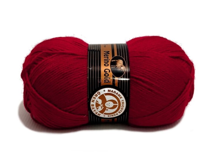 Włóczka Merino Gold w kolorze ciemnoczerwonym nr 033 – miękka wełna z akrylem na eleganckie swetry.