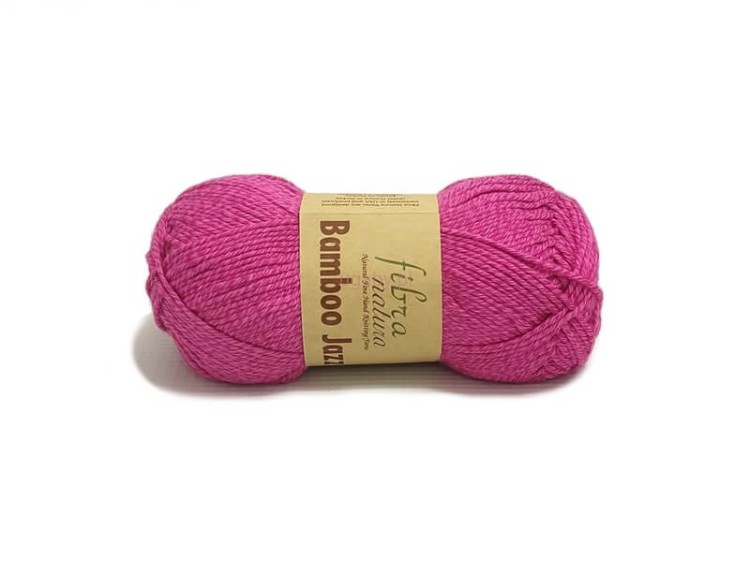 Motek jasnoróżowej włóczki Fibra Natura Bamboo Jazz o numerze 214, o gładkiej strukturze i pudrowym odcieniu.