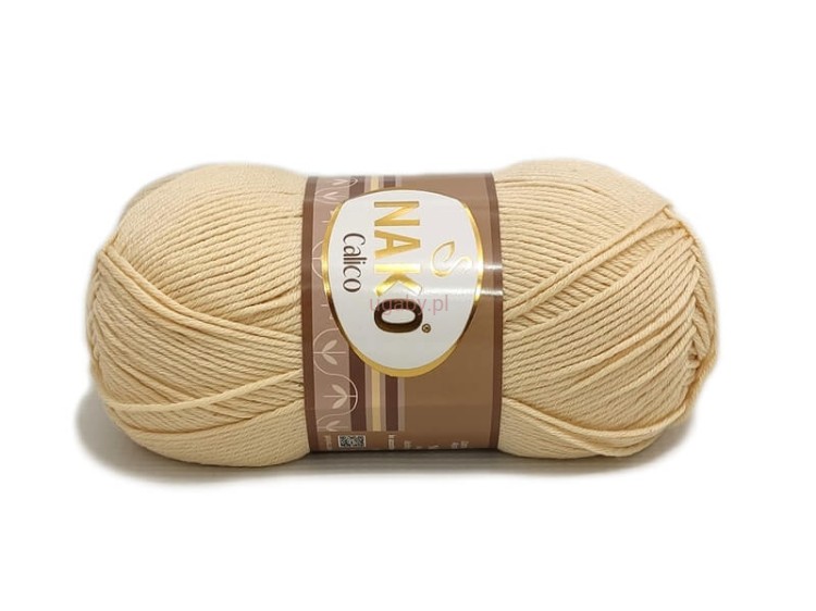 Motek włóczki Nako Calico w neutralnym, cielistym kolorze (beżowym) o numerze 481.