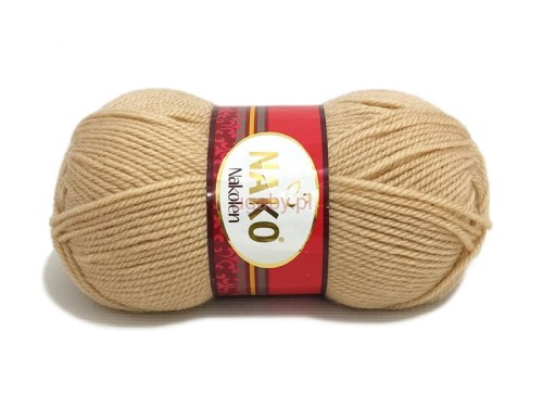 Włóczka Nako Nakolen w kolorze beżowym, numer 219. Ciepła mieszanka wełny i akrylu na swetry i czapki.